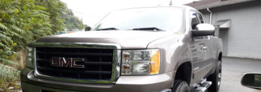New Step Bars and Truxedo Bed Cover Upgrade for 2011 GMC Sierra