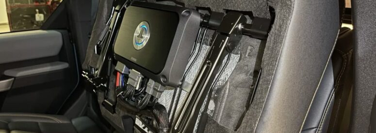 A car audio amplifier instillation in progress
